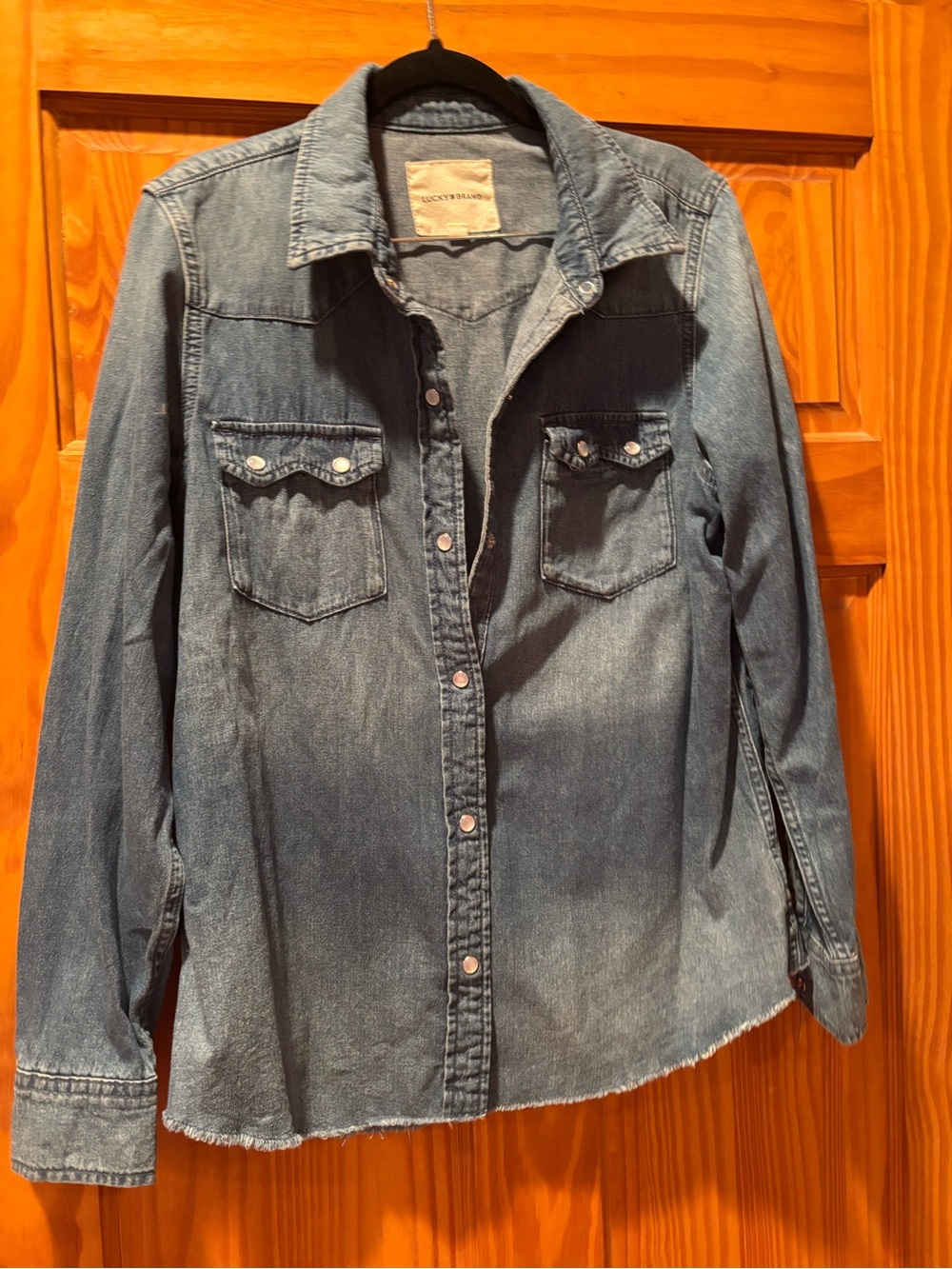 Lucky Brand light blue denim shirt with tan label